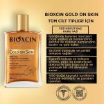 روغن مرطوب کننده و شاین صورت و بدن و مو بیوکسین مدل Gold On Skin حجم 100 میلی لیتر